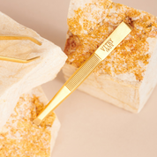 Gold-plated stainless steel tweezers with slanted tips